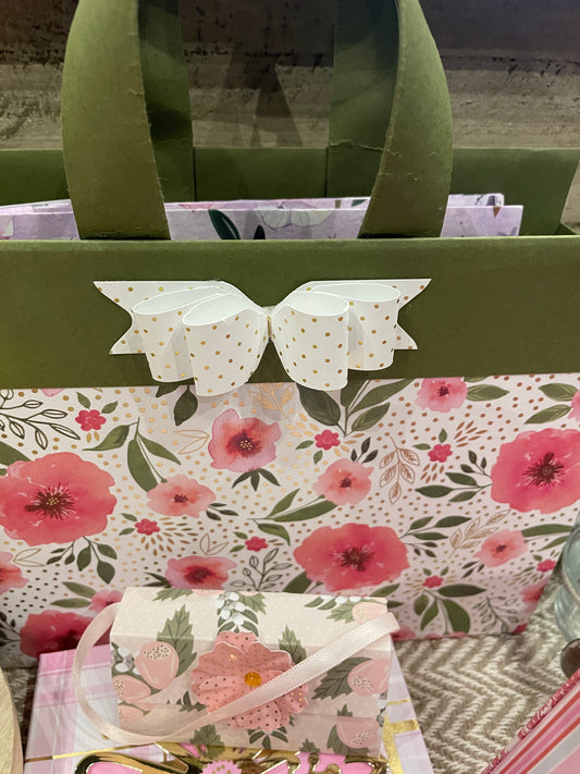 Green and pink bag with white bow